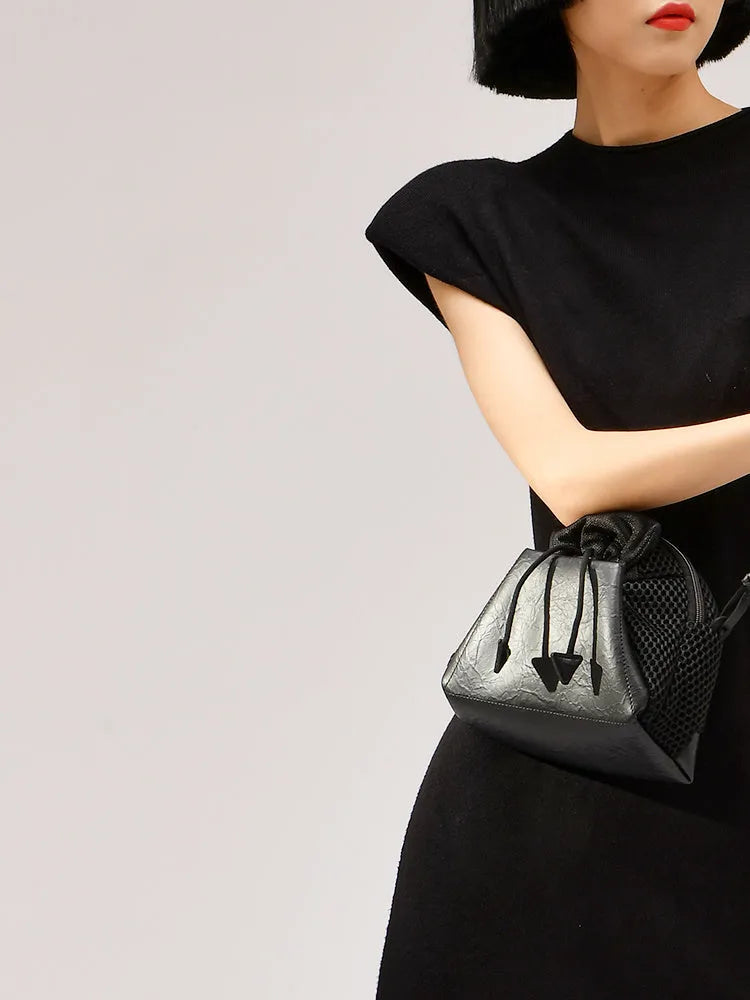 Women's fabric crossbody shell fashion bag with zip closure in Cream, Khaki, or Magic Black.