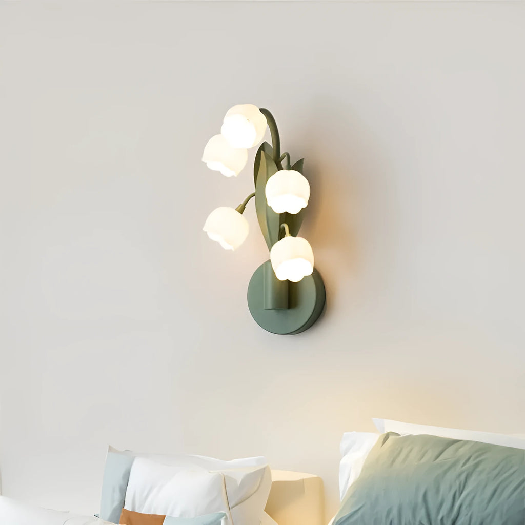Green-tricolour French pastoral style wall lamp with a white minimalist PC shade mounted on a bedroom wall.