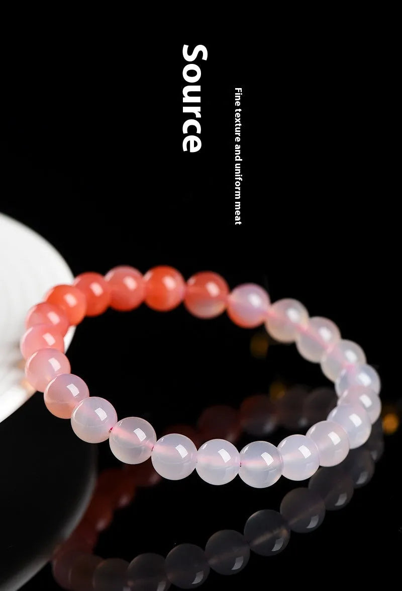 Yanyuan agate bracelet showing gradient salt source colour on wrist, with geometry style beads.