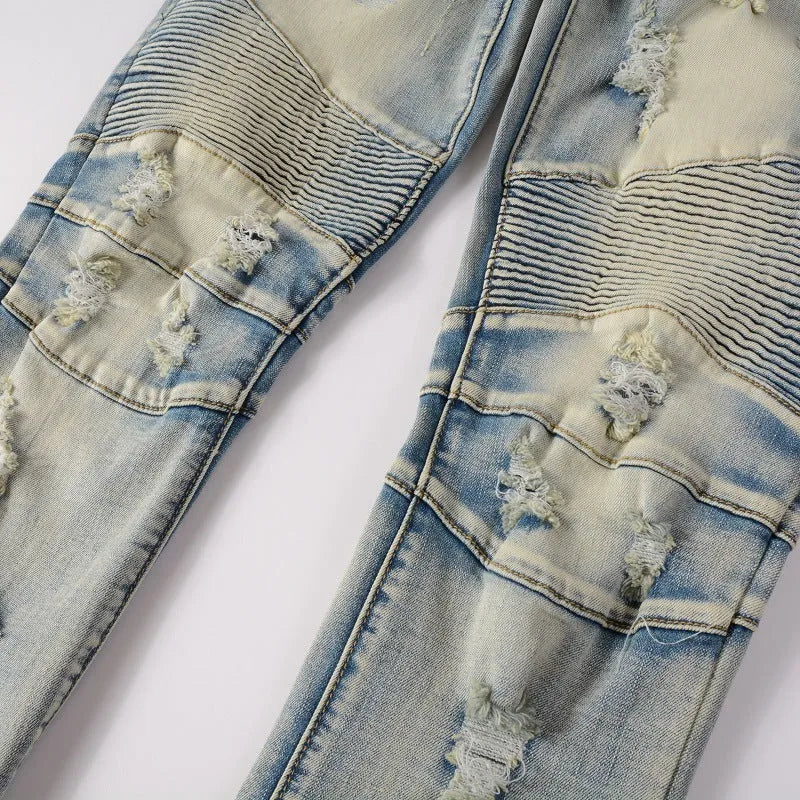 Light blue men's slim fit distressed jeans with hand-frayed detailing and stretch denim