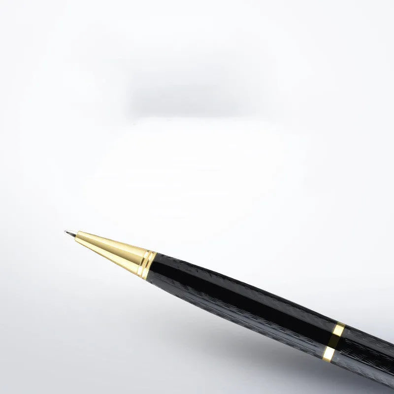 Black pen-shaped digital voice recorder with zinc alloy casing on a white background.