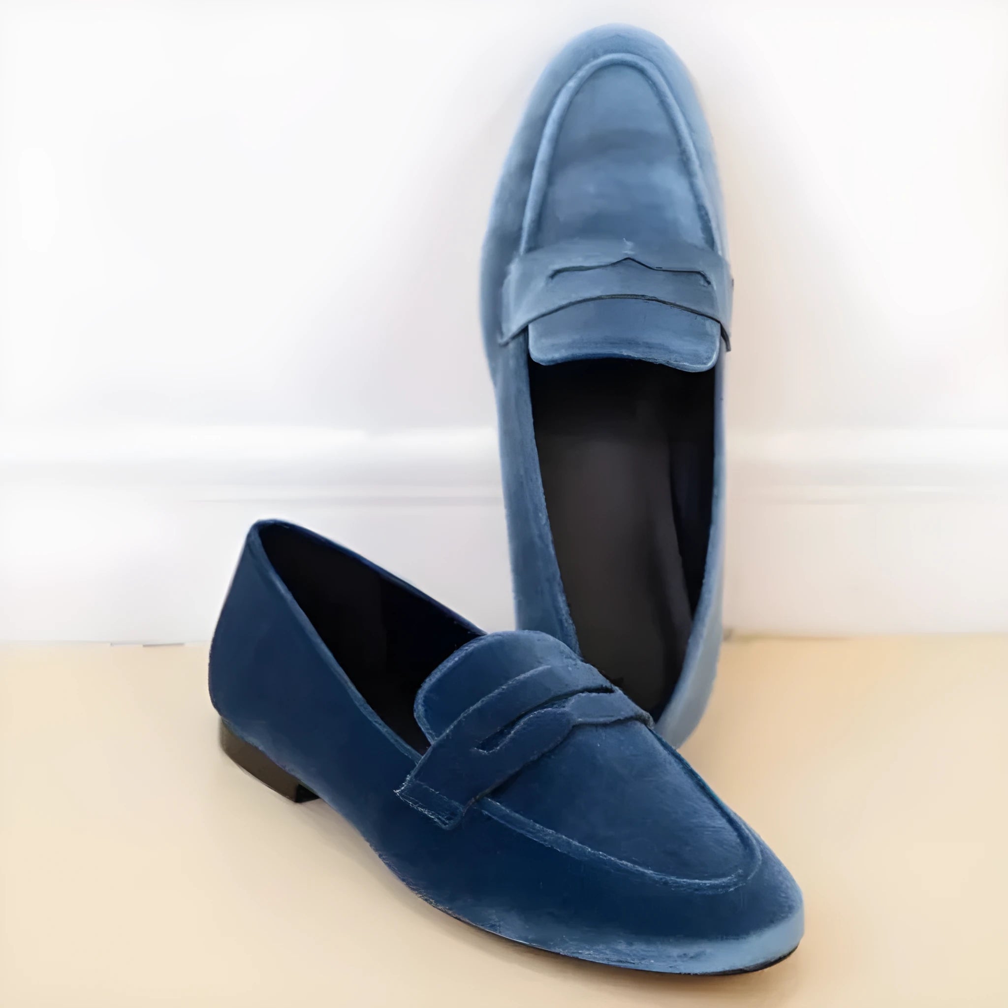 Blue leisure flat suede loafers with black rubber sole, slip-on design, and round toe