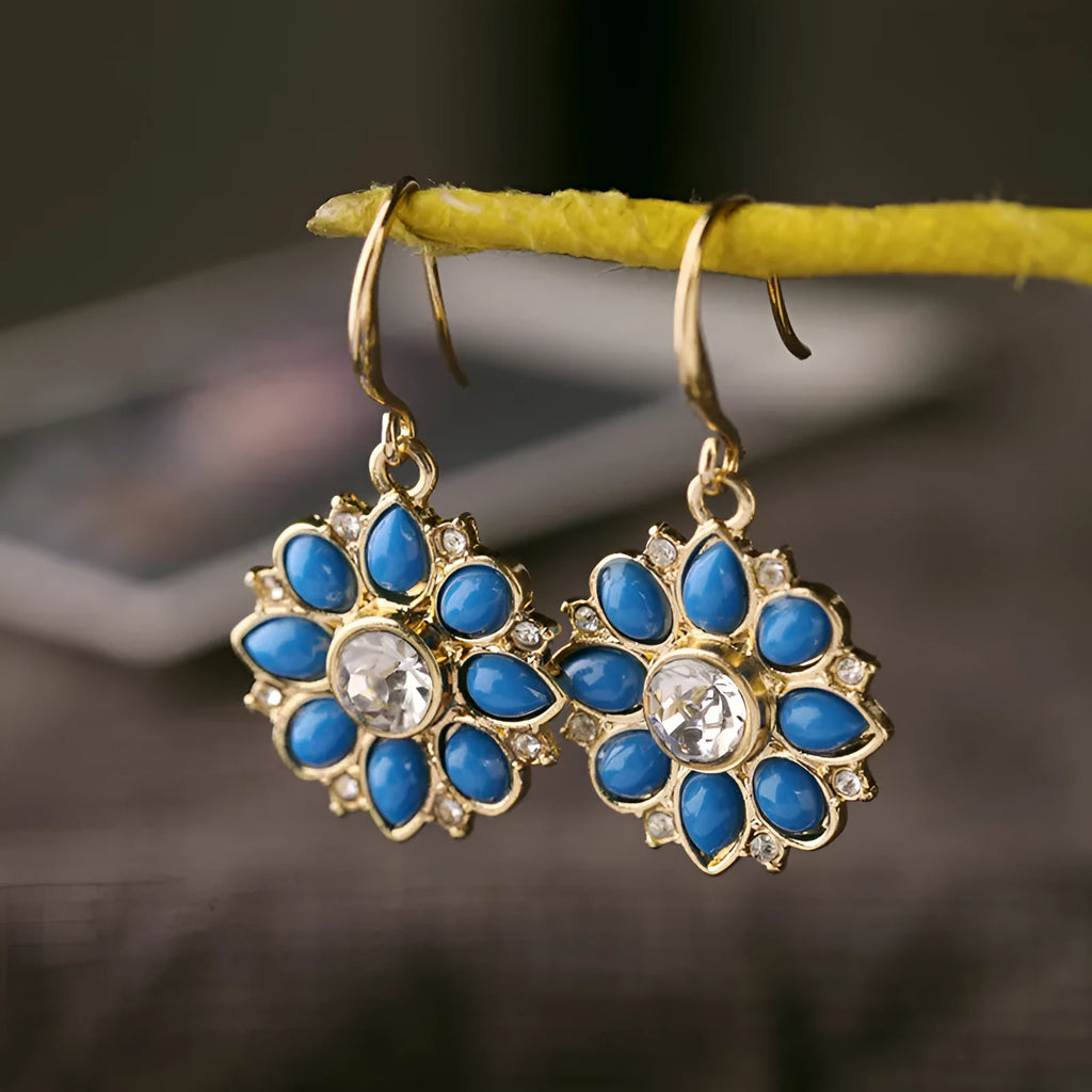 Pair of alloy flower-shaped earrings with artificial gemstone inlay, available in blue or red for women