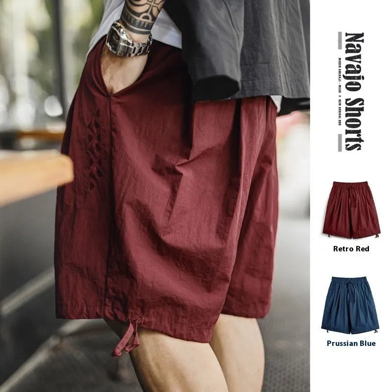 Men's Prussian Blue nylon shorts with embroidery and loose fit for summer beach wear