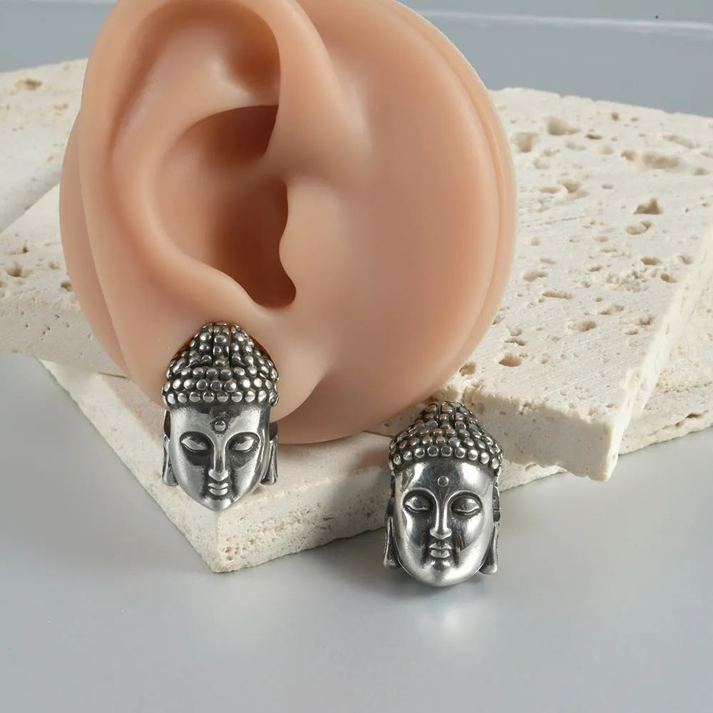Stainless steel hollow skull Buddha earrings with geometric design in four colour options