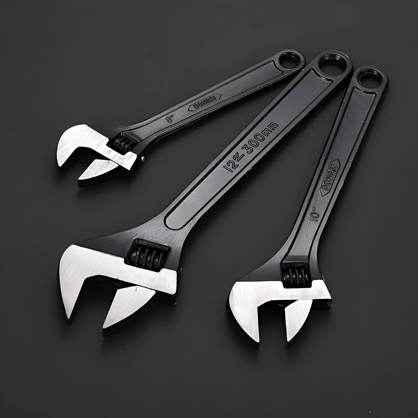 Blackened high carbon steel adjustable open-end wrench showing adjustable jaw mechanism and ergonomic handle