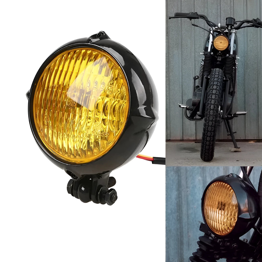 Black retro-style aluminium motorcycle headlight for Harley models with yellow glass lens.