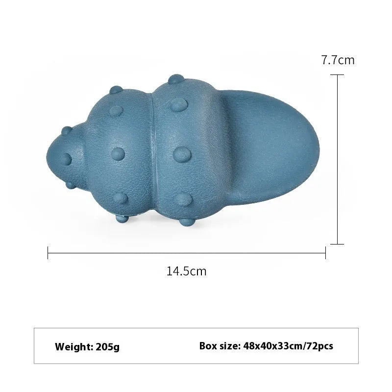 Rubber shark-shaped dog toy with ocean theme details in blue or green colour options