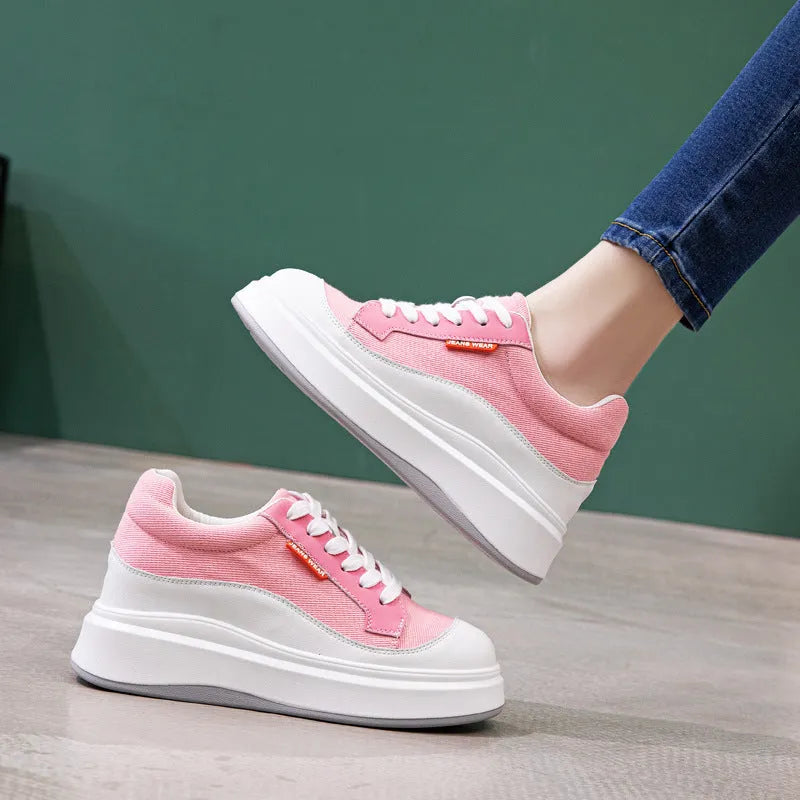 Women's beige leather casual shoes with thick flat soles showing side profile