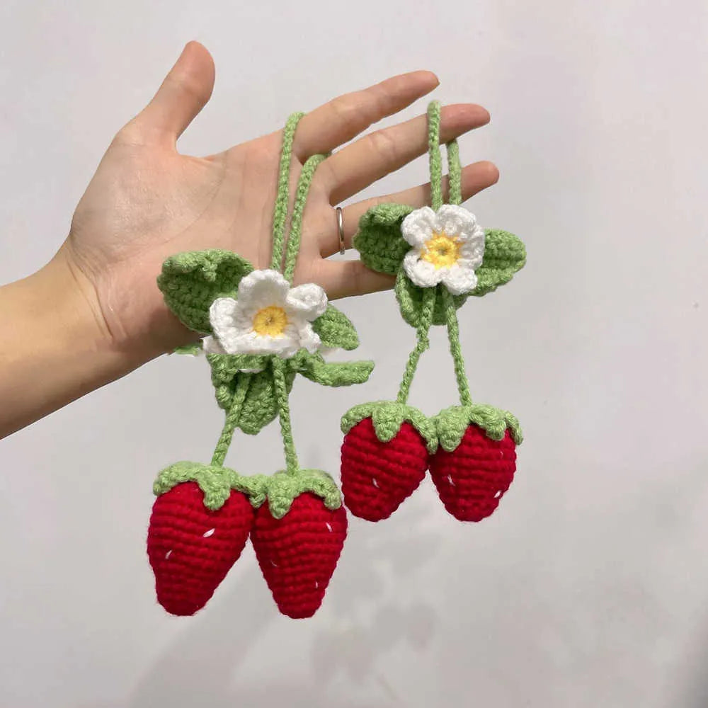 Handmade strawberry-shaped car decoration pendant woven from cotton and hemp materials using hook knitting techniques