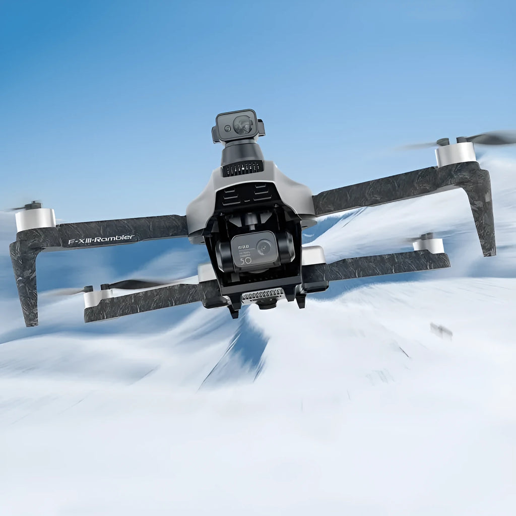 White F13 folding quadcopter drone with camera gimbal, obstacle sensors, and remote controller on a table.