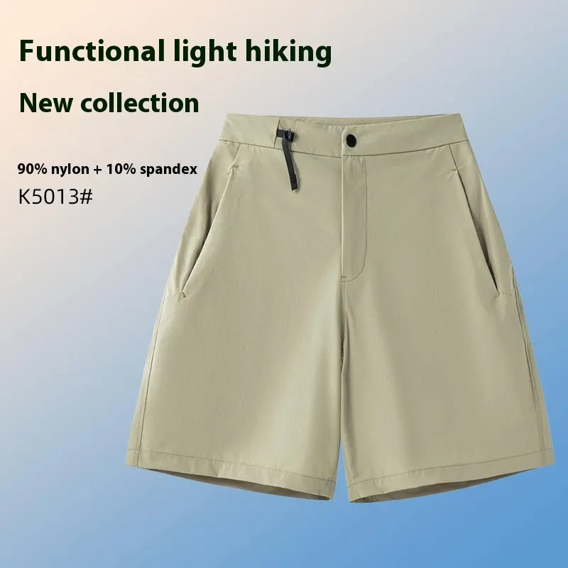 Men's solid colour sport shorts with elastic waistband, shown in army green, for running and climbing activities.