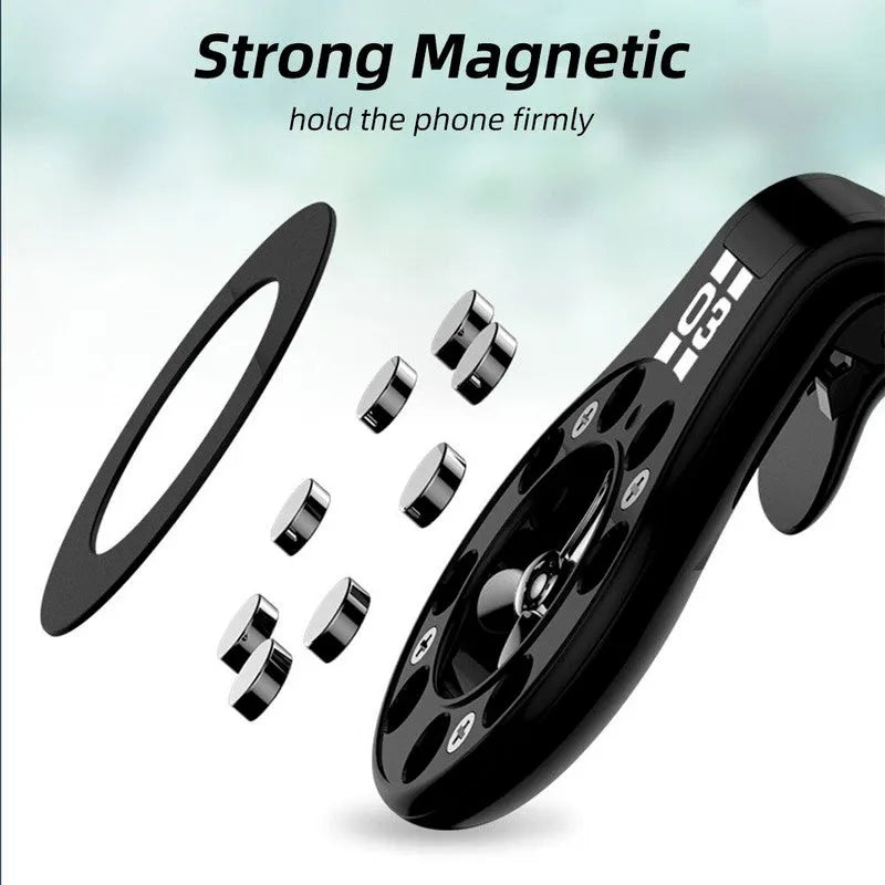 Black magnetic car phone holder clipped to car air vent with smartphone attached and fragrance pads