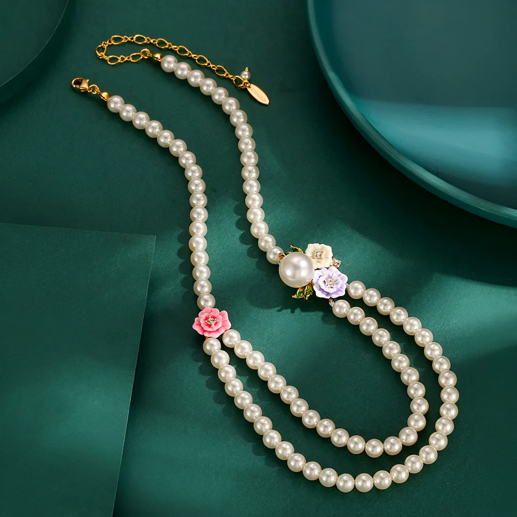 Enamel glaze diamond three-colour rose double-layer pearl necklace for women on display