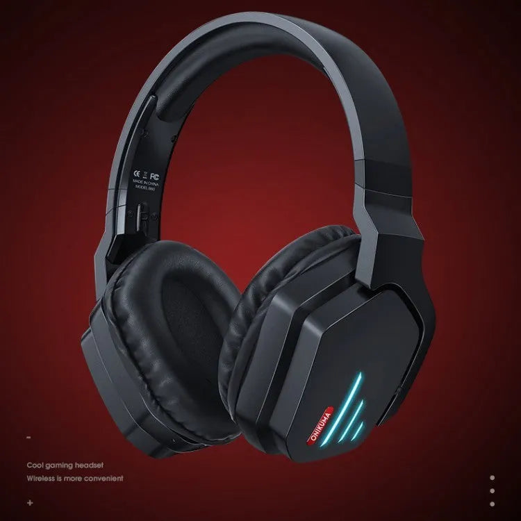 Luminous black wireless head-mounted stereo headphones with ear cups and headband on a grey background.