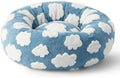 Round plaid dog bed with a plastic base, shown in a sea blue and white colour.