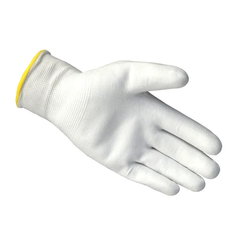 White PU-coated work gloves showing flexible fit and 24 cm length on a workbench.