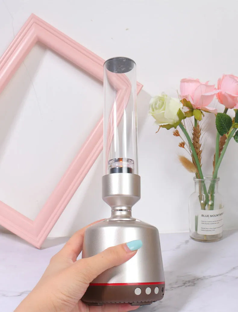 White silver Bluetooth speaker with candlelight-style atmosphere night light, 277mm tall