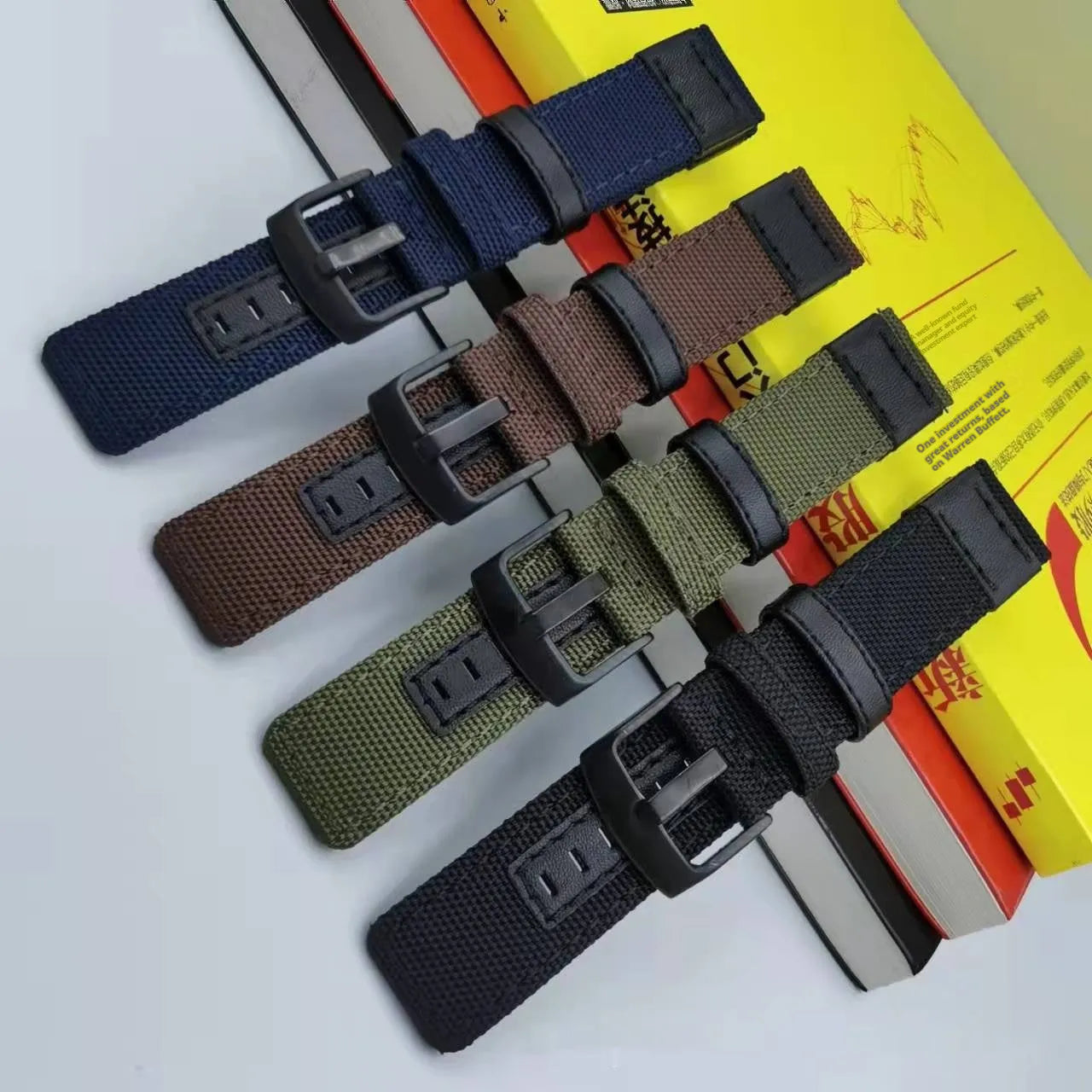 Oxford cloth canvas watch strap shown in multiple colour options including black, army green, and camouflage.