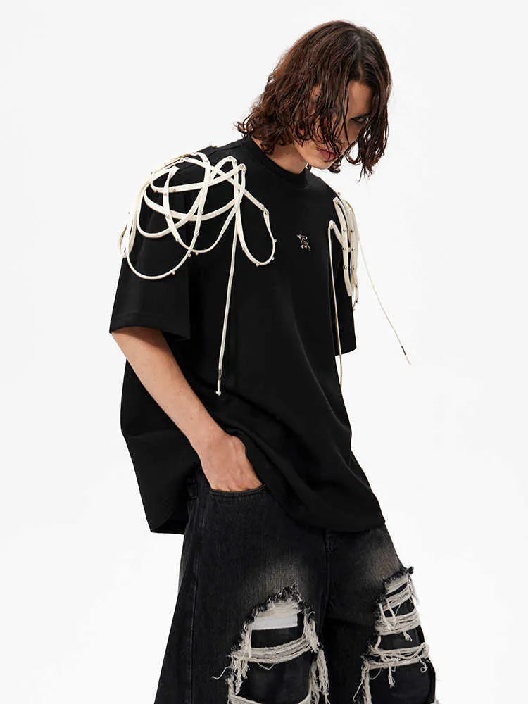 Black loose fit T-shirt with rivet ribbon padded shoulders, short sleeves, round neck