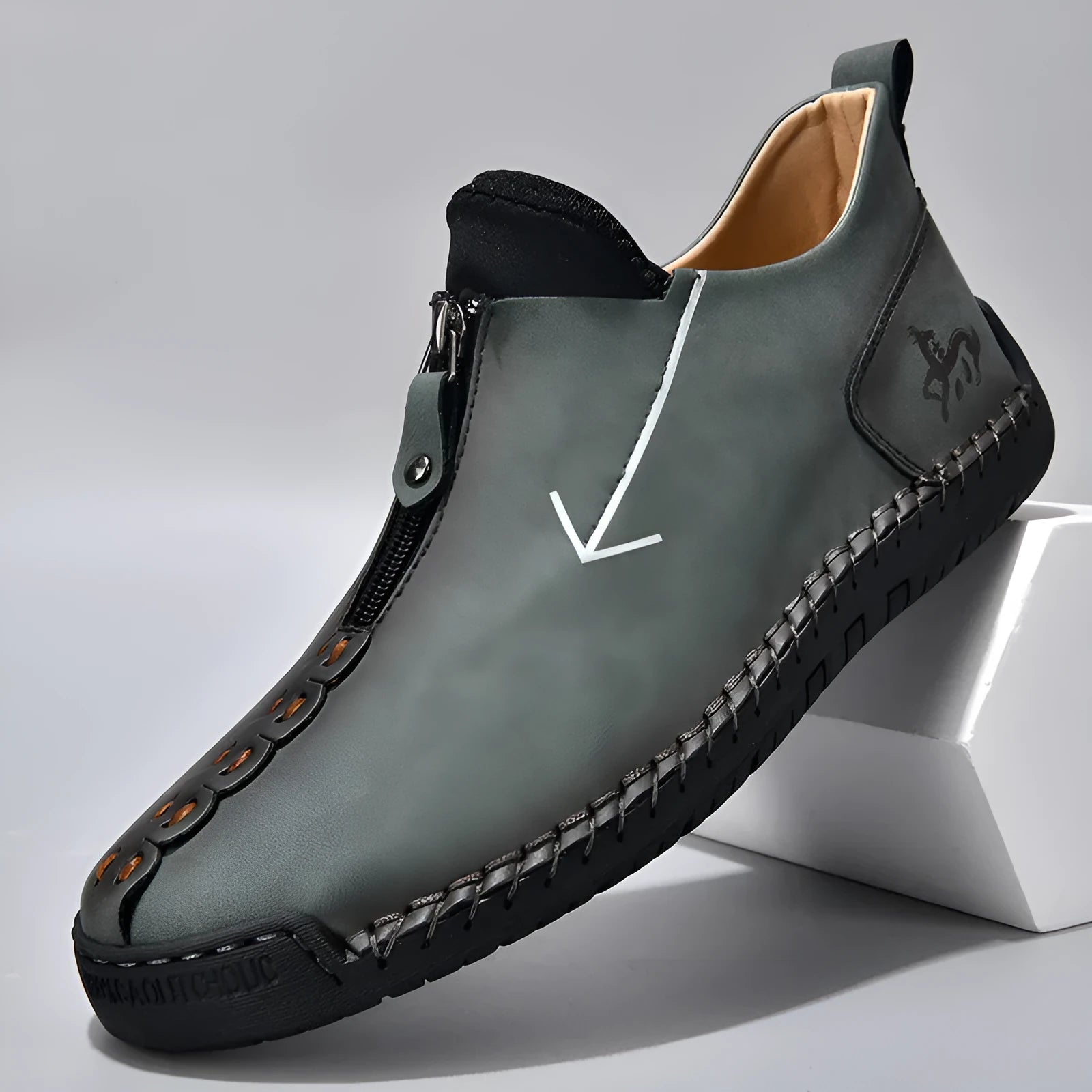 Men's black leather martin boots with front zipper and round toe design on rubber sole