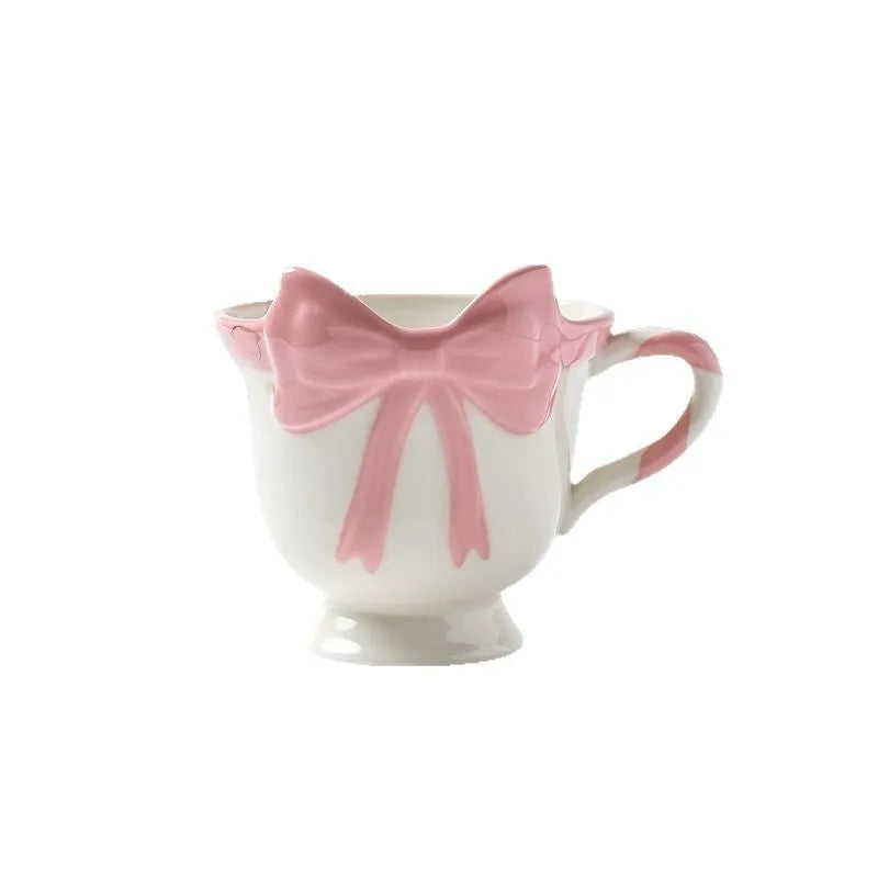 Ceramic heart bow mug with handle in white powder or black pink colour, 330ml capacity