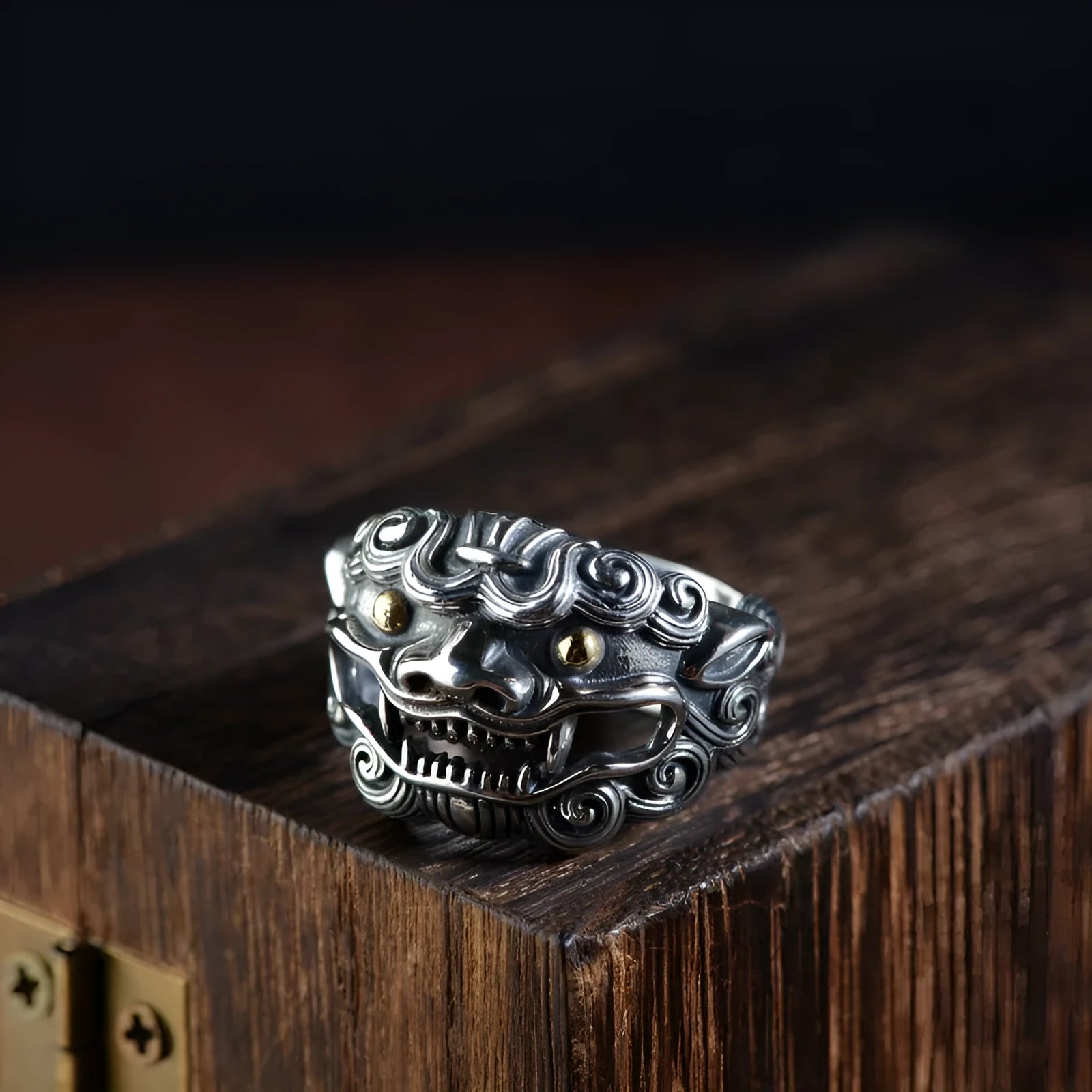 Sterling silver open ring with a detailed domineering jibeast animal and zodiac pattern.
