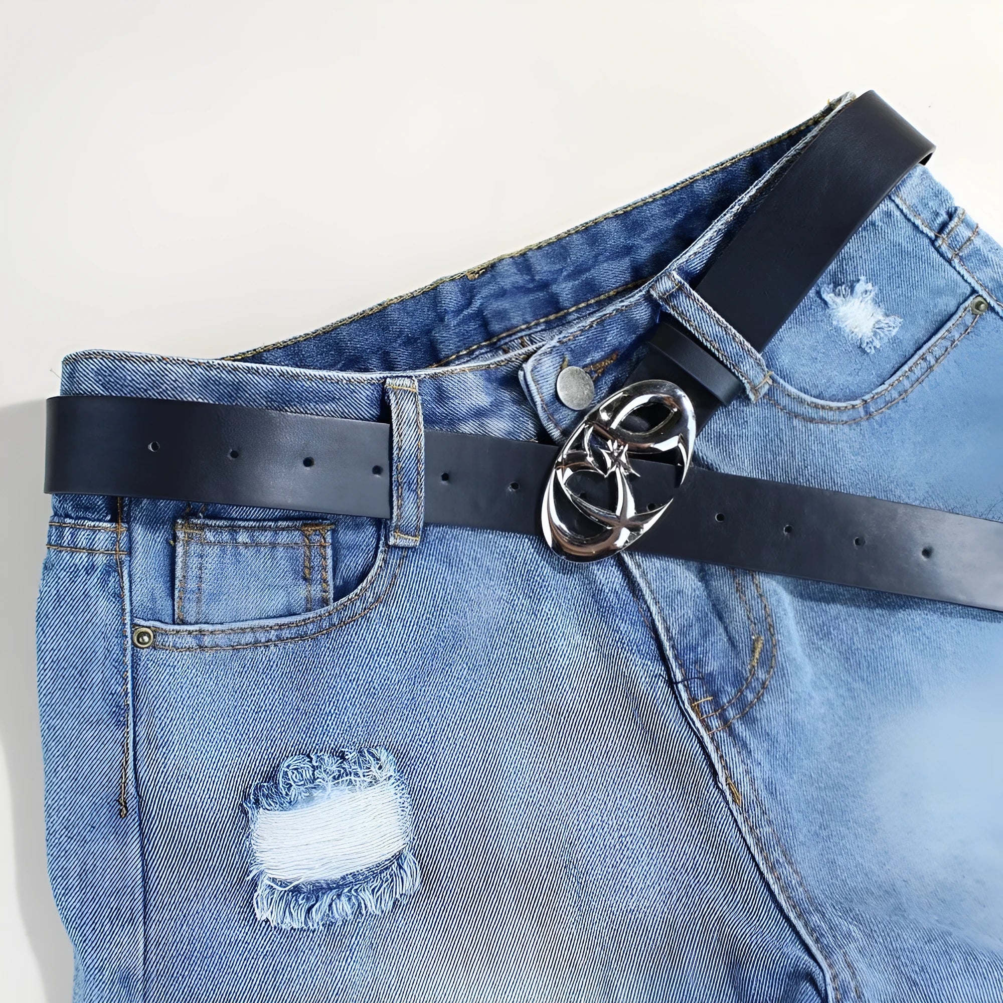 Silver buckle casual PU leather belt with snap button fastening, shown flat.