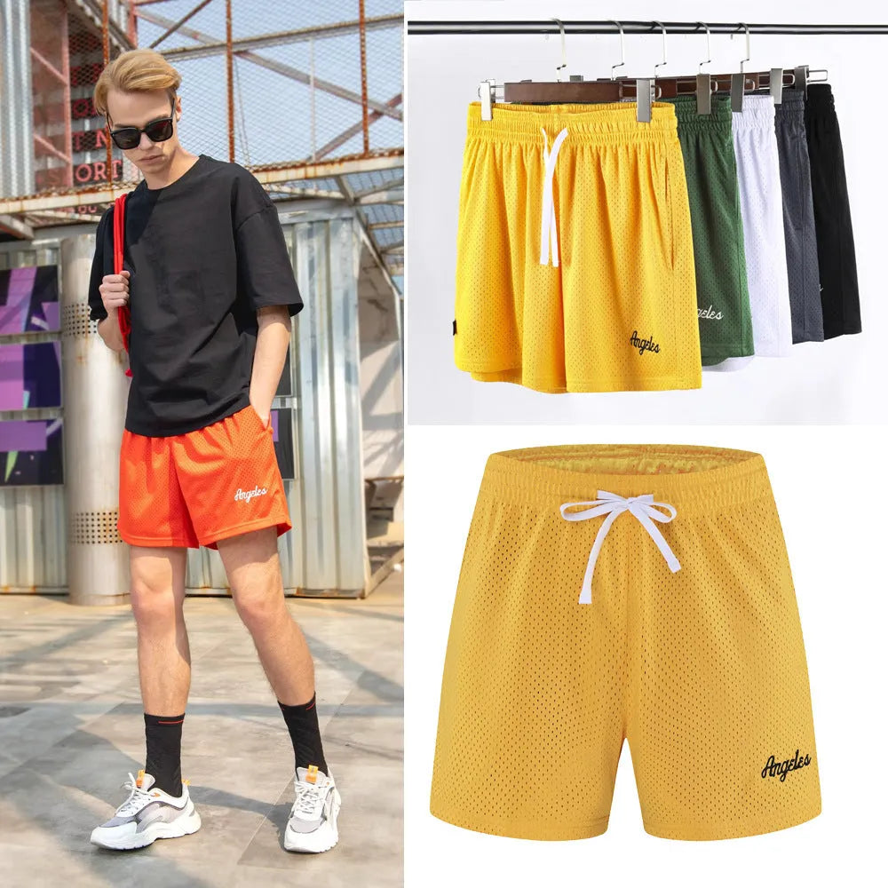 Men's black double-layer mesh sports shorts on a white background.