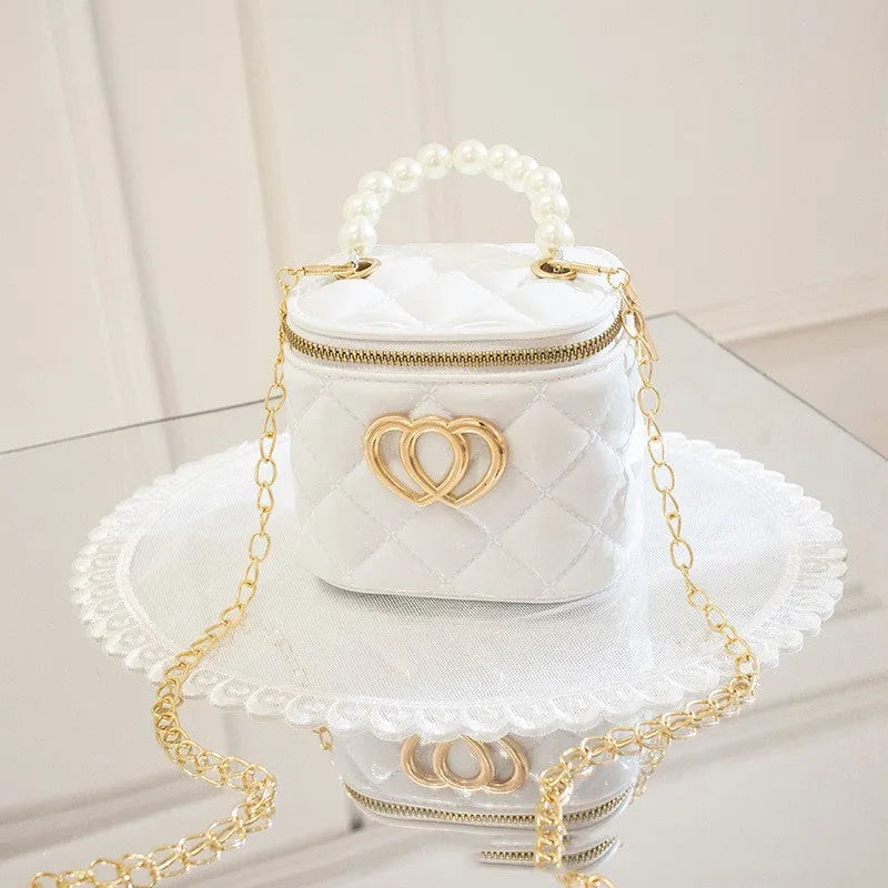 White PVC bucket handbag with a heart-shaped pattern