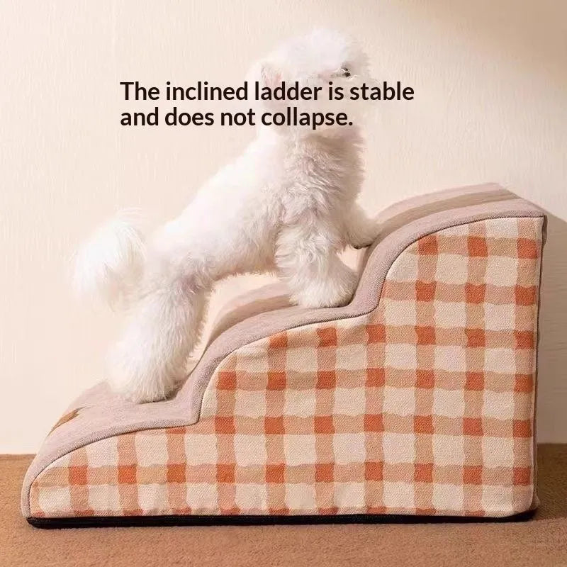 Wooden pet climbing ladder with fabric steps in orange bear plaid pattern beside a bed