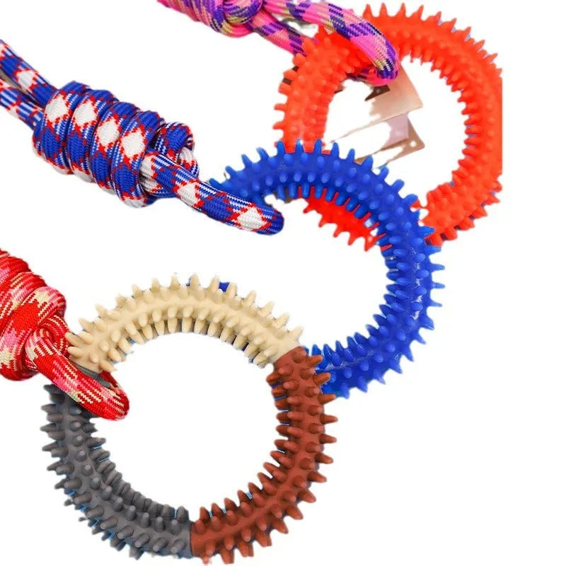 Blue braided rope dog toy with a central knot, shown next to a red and rose red version.