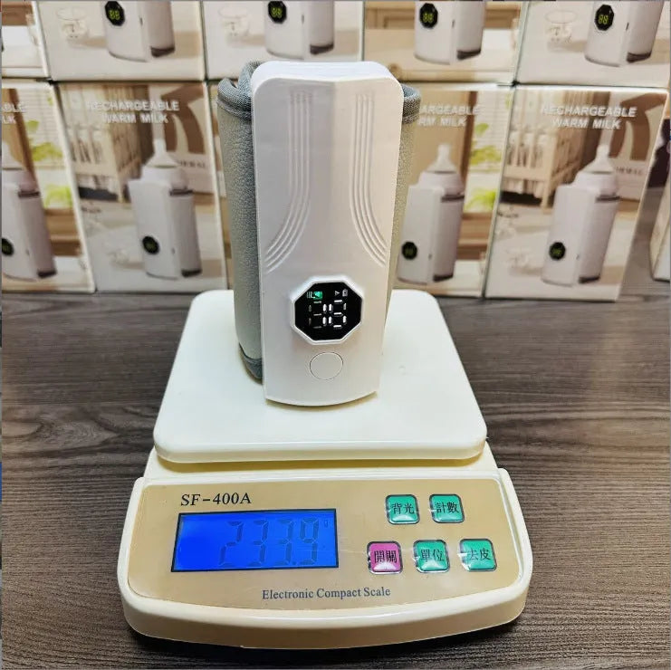 Grey and white portable electric milk warmer for car charger sockets