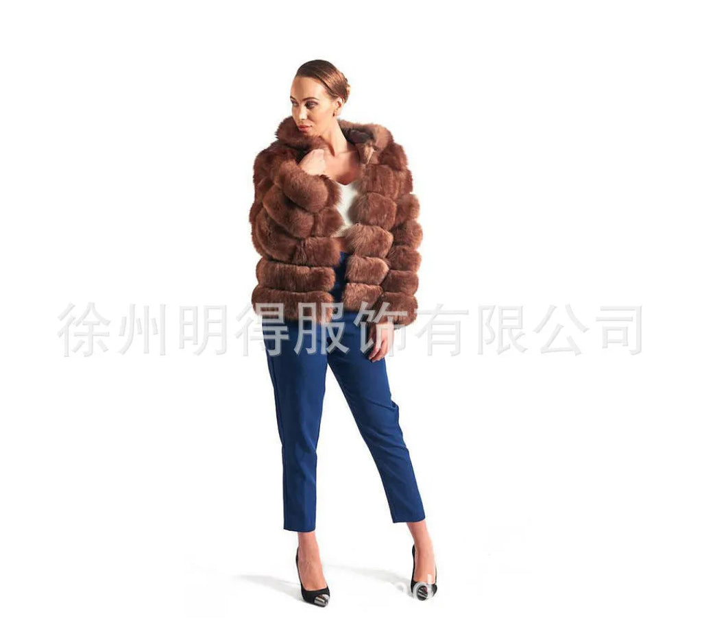Loose-fitting women's hooded coat in artificial fur, shown in brown colour, with street fashion style.