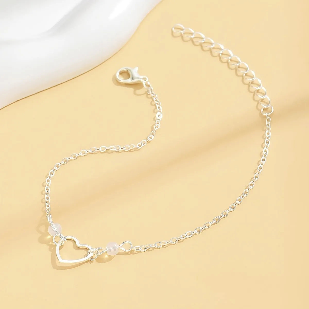 Women's gold heart pendant adjustable anklet with geometric design