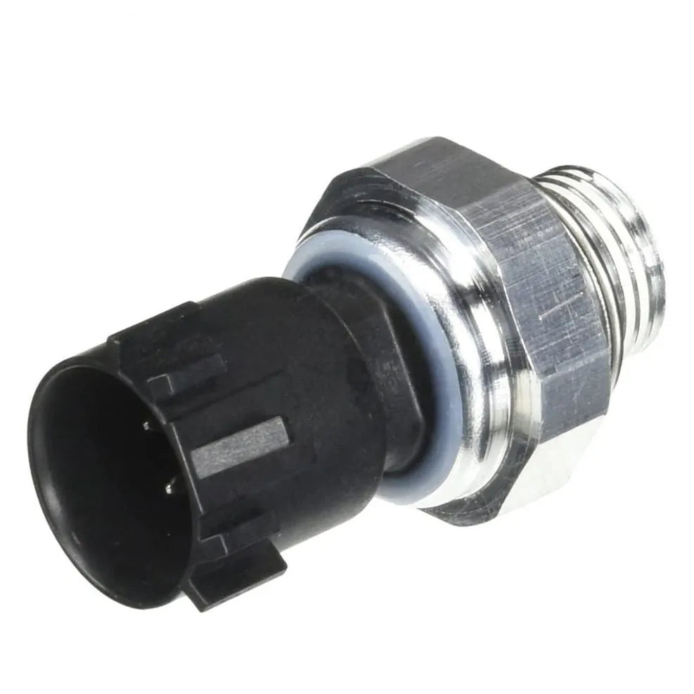 Silver automobile fuel pressure sensor with single port on a white background.