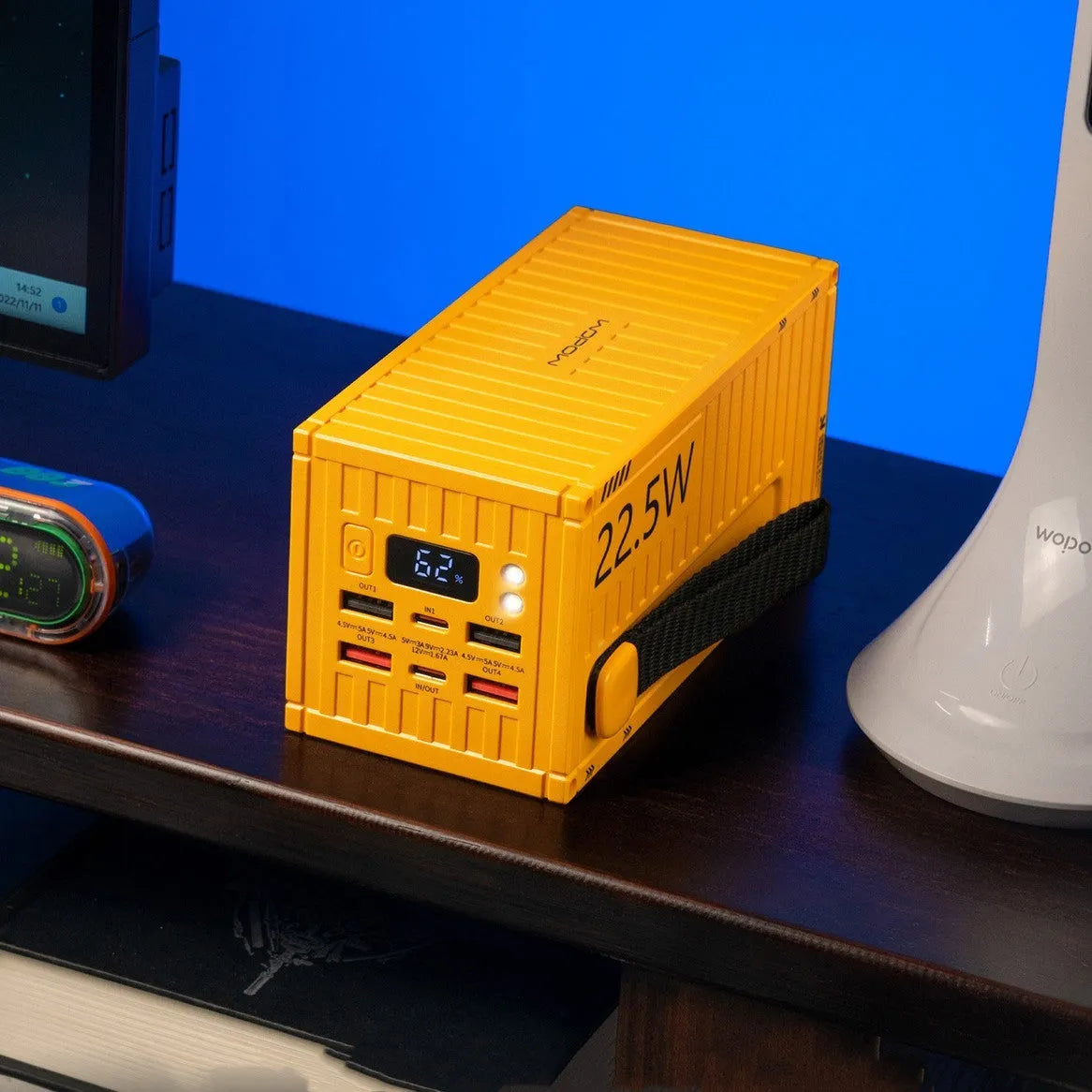 Yellow 50000mAh digital display power bank with five charging ports and emergency lighting