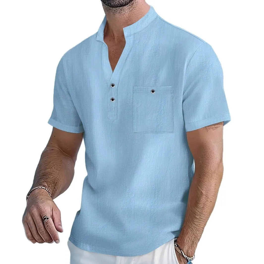 Men's light blue linen short sleeve shirt with a stand collar in a loose pullover fit.