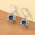 Women's geometric earrings with vintage engraving and hollow blue gemstone pendants in silver colour