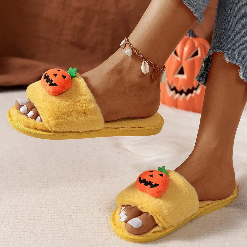Halloween cartoon pumpkin design open-toe plush slippers on a white or yellow synthetic fur upper with PVC sole.