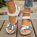 White women's high heel sandals with an adjustable velcro strap buckle fastening.