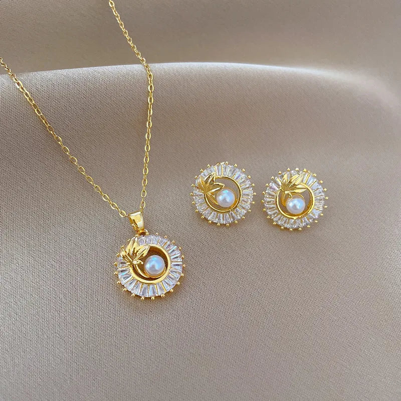 Women's titanium steel geometric jewellery set with copper pendant necklace and gold-plated earrings