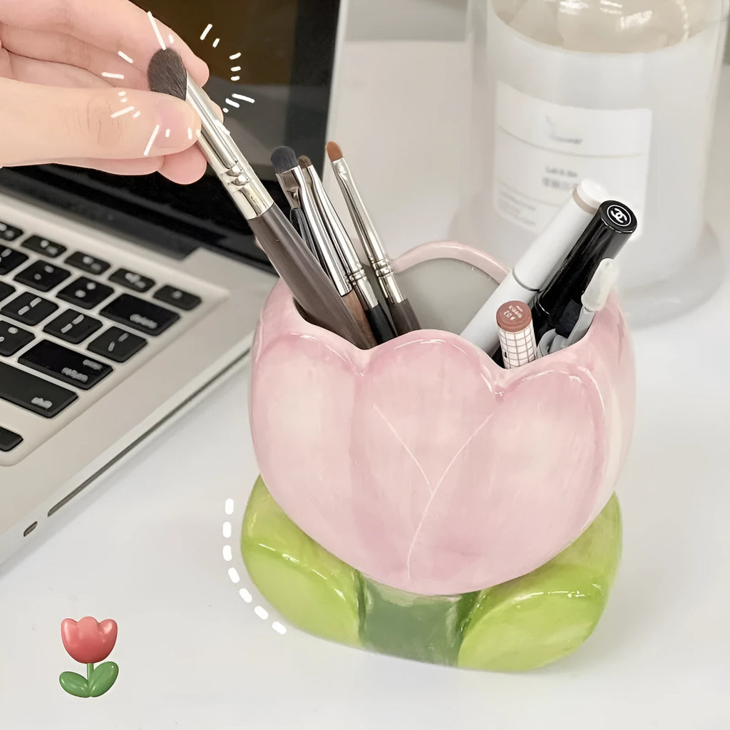 Ceramic desktop pen holder box with floral design in blue, pink, or purple.