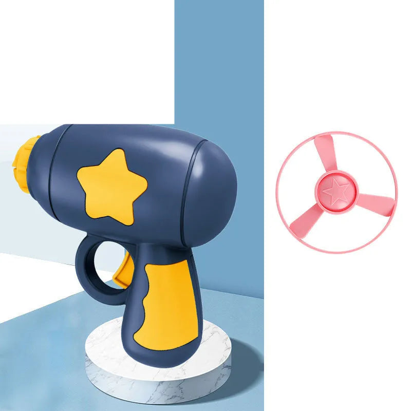 Flying saucer launcher toy set with plastic disc shooter gun, flashing discs, and target board, in blue, navy, pink, and yellow