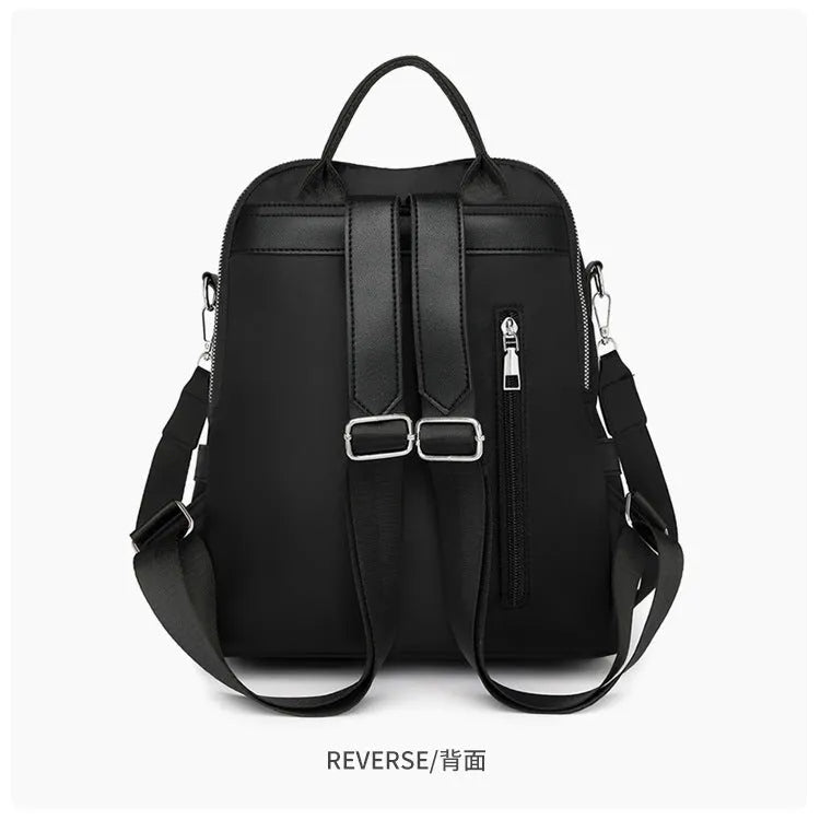 Large capacity black PU commute backpack with three-dimensional pockets and soft construction