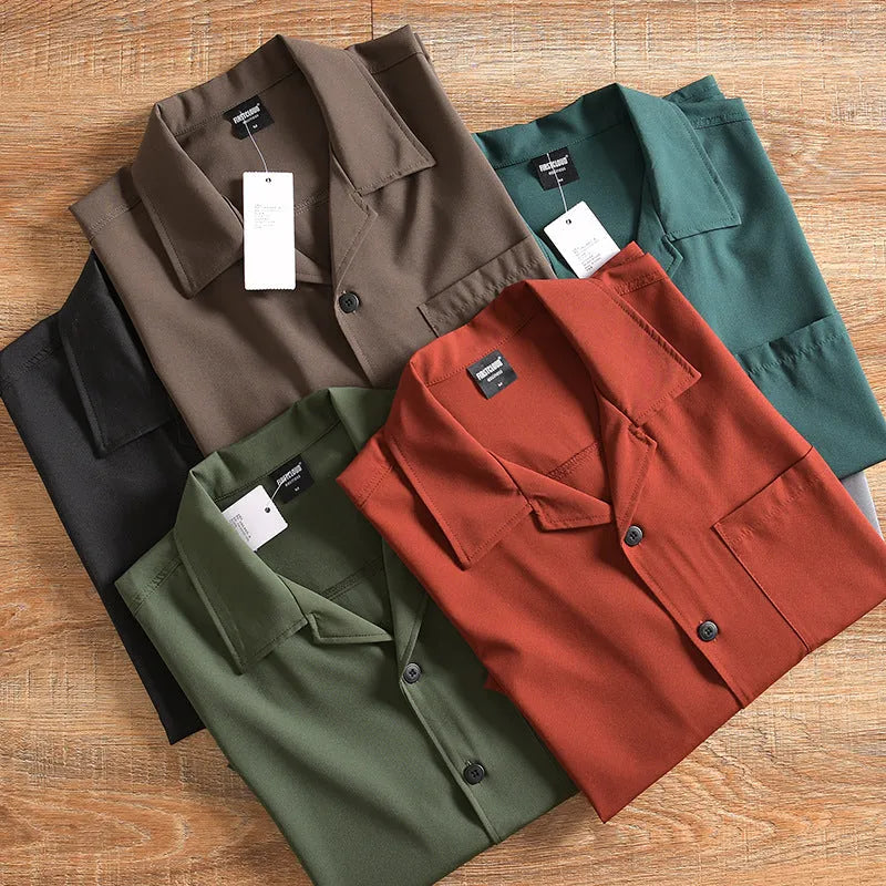 Men's loose fit lightweight short sleeve shirt in a solid colour, showing front design.