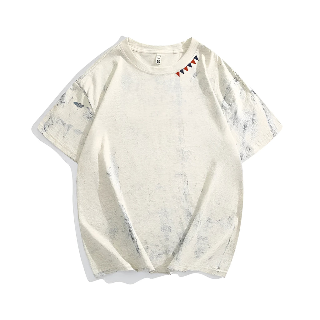 Gray tie dye T-shirt with all-over paint print design, loose fit with short sleeves and round neck