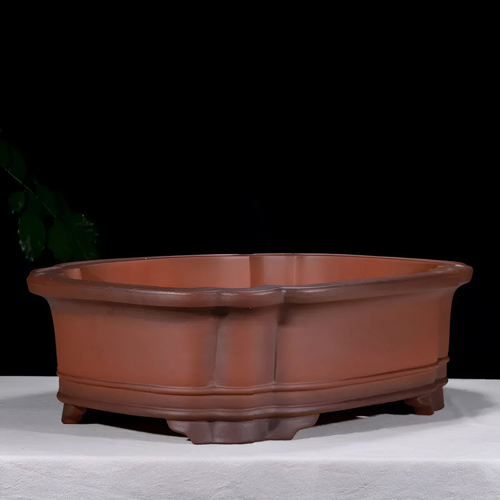 Chinese-style antique finish purple clay oval flowerpot measuring 71cm long by 54cm wide