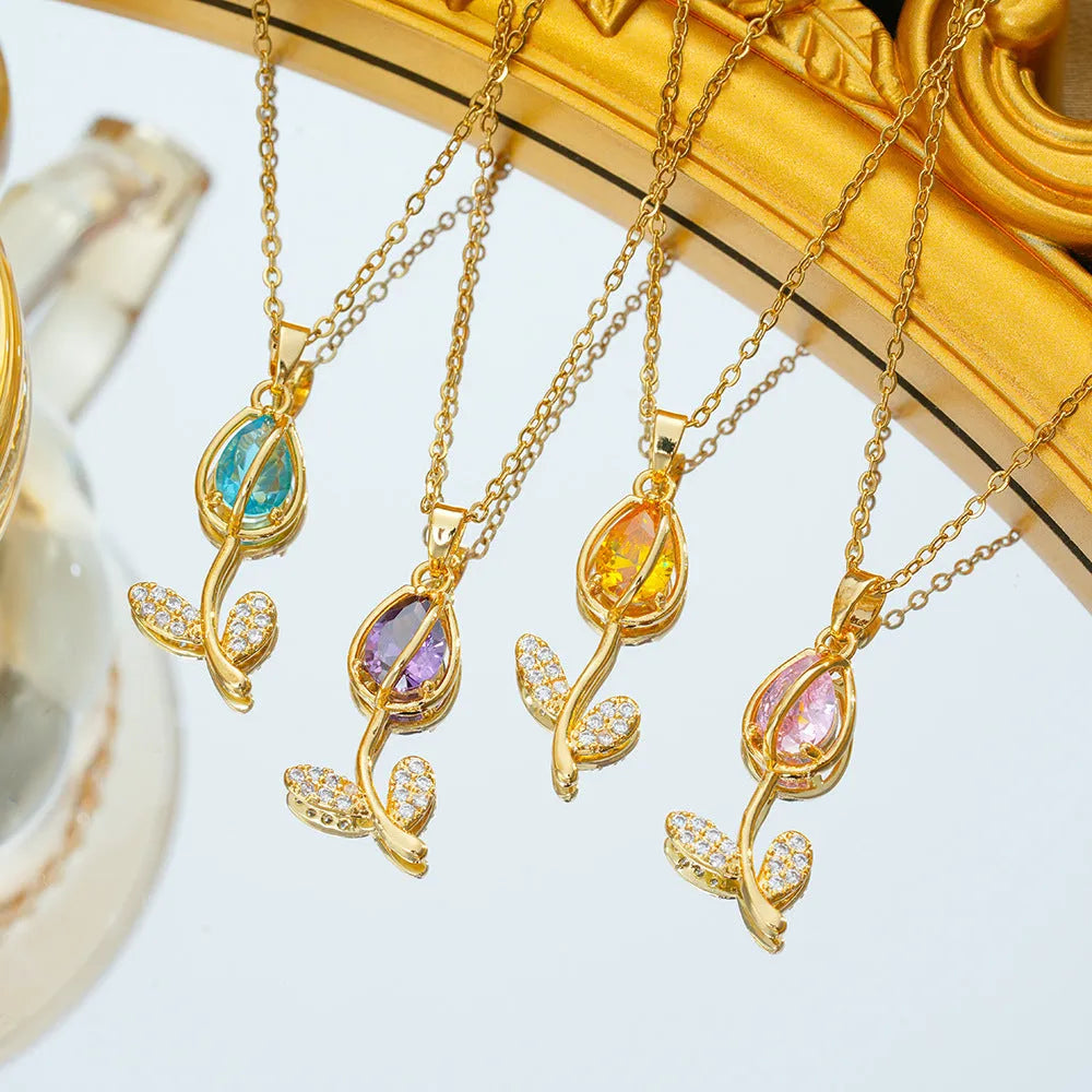 Women's zircon tulip necklace with electroplated finish on adjustable titanium steel chain showing floral pendant