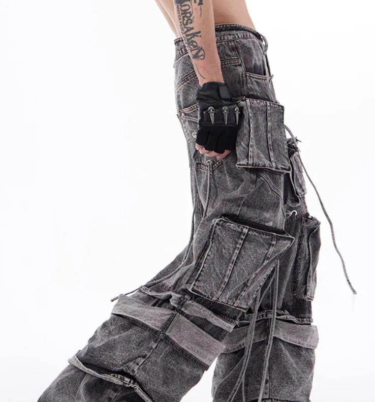 Grey distressed denim overalls with rope stitching detailing in American-style design